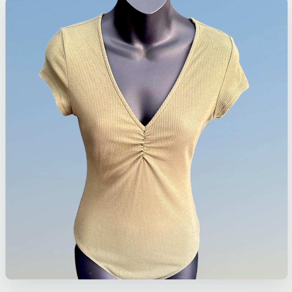 Olive green or mossy green body suit